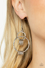 Load image into Gallery viewer, An antiqued collection of dainty silver rings swings from the bottoms of hammered silver hoops that interconnect into an edgy lure. Earring attaches to a standard fishhook fitting.
