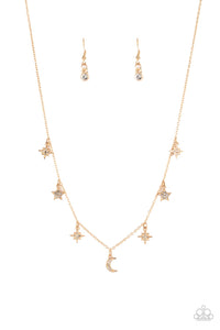 Dotted with dainty white rhinestones, a stellar collection of gold moon and star charms swing from a dainty gold chain below the collar, creating a cosmic fringe. Features an adjustable clasp closure. 