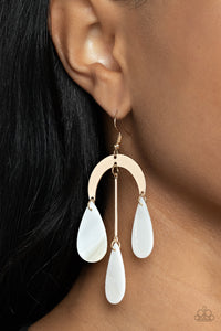 White shell-like teardrops trickle from the bottom of a gold rod and gold half moon frame, creating an ocean inspired chandelier. Earring attaches to a standard fishhook fitting.