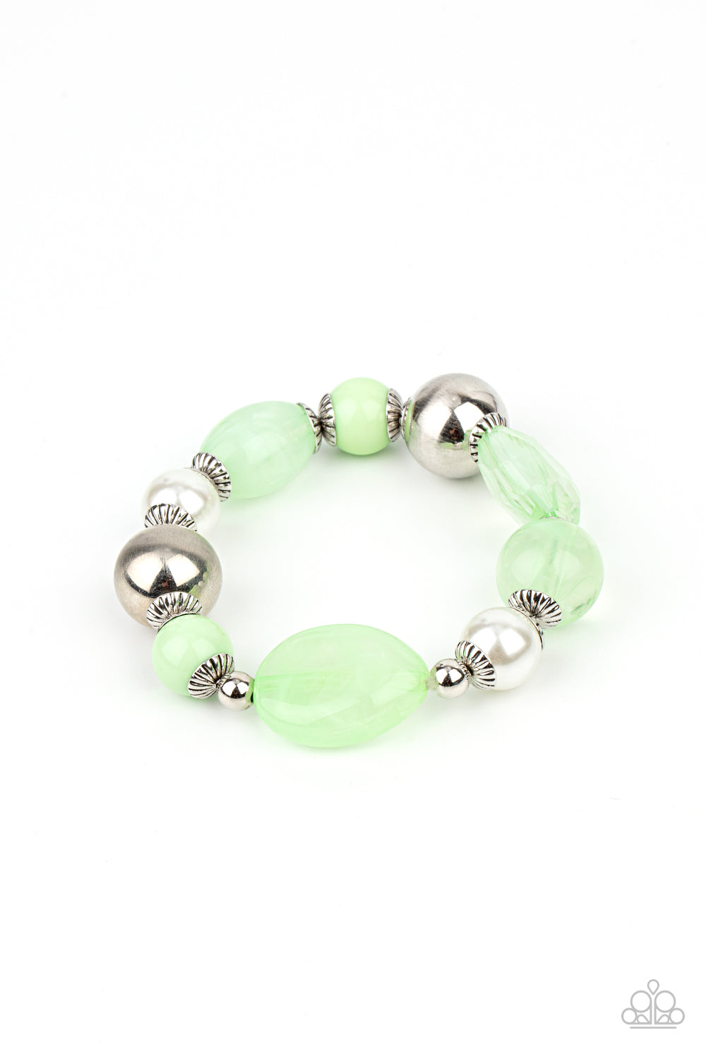 A lavish assortment of white pearls, silver accents, and glassy and acrylic Green Ash beads are threaded along a stretchy band around the wrist for a refreshing pop of color.