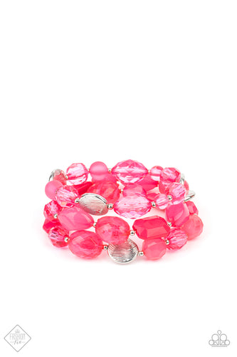 Glassy and opaque Raspberry Sorbet crystal-like beads and textured silver accents are threaded along stretchy bands around the wrist, creating vivacious layers.  Sold as one individual bracelet.