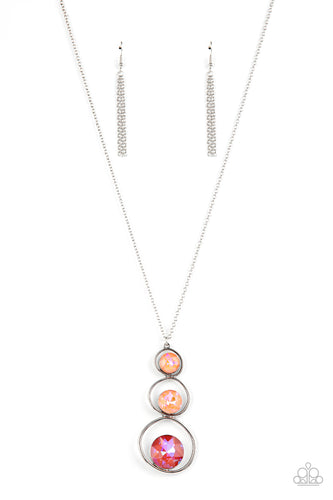 A sparkly ombré of opalescent coral gems adorn the bottoms of three silver hoops that gradually increase in size as they stack into an asymmetrical pendant. The glowing pendant swings from the bottom of a lengthened silver chain, creating a stellar centerpiece. Features an adjustable clasp closure.