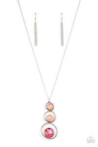 A sparkly ombré of opalescent coral gems adorn the bottoms of three silver hoops that gradually increase in size as they stack into an asymmetrical pendant. The glowing pendant swings from the bottom of a lengthened silver chain, creating a stellar centerpiece. Features an adjustable clasp closure.