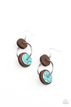 Load image into Gallery viewer, An earthy collection of brown wood and turquoise stone discs are threaded along a silver hoop, linking into a trendy lure for an artisan inspired fashion. Earring attaches to a standard fishhook fitting. 
