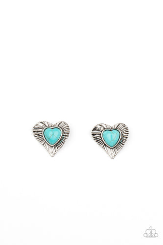 Etched in rustic texture, an antiqued silver frame gathers around a heart shaped turquoise stone center, creating a romantic display. Earring attaches to a standard post fitting.