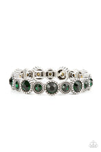 Load image into Gallery viewer, Sparkling green gems are encased in studded silver frames. Varying in size, smaller gems alternate with larger gems along stretchy bands around the wrist for a dramatic look. 
