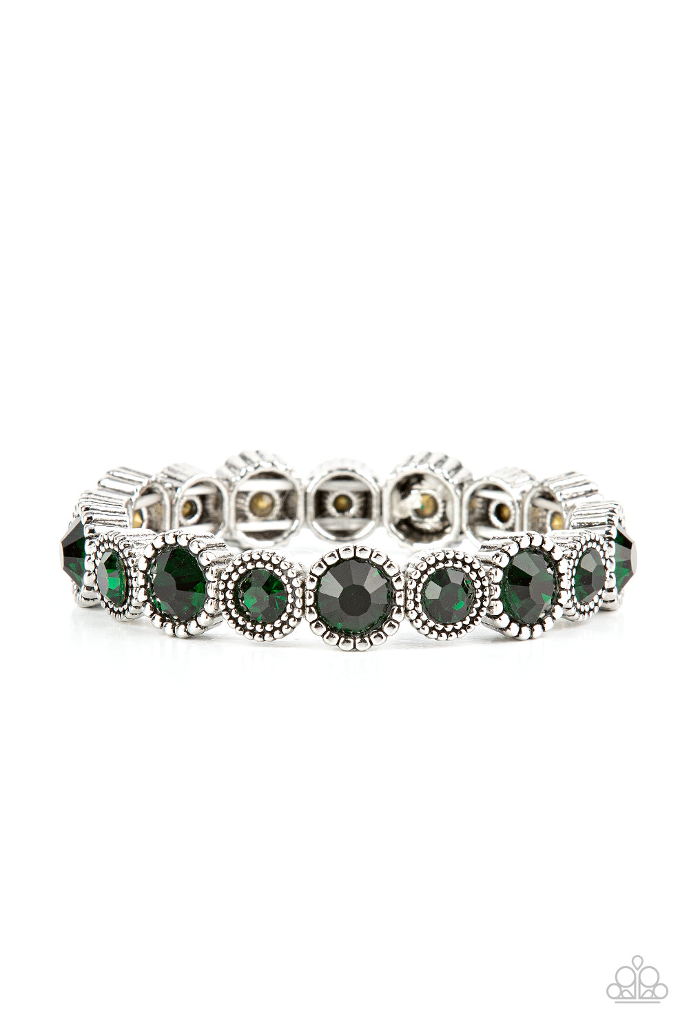 Sparkling green gems are encased in studded silver frames. Varying in size, smaller gems alternate with larger gems along stretchy bands around the wrist for a dramatic look. 