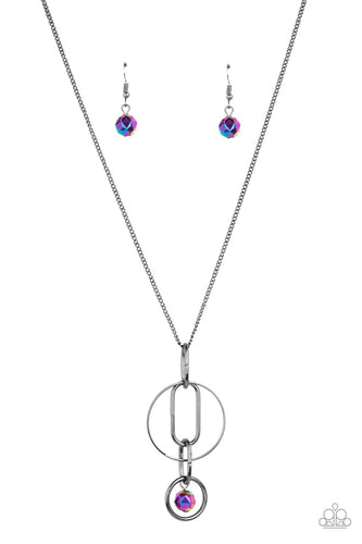 A collection of oval and round gunmetal links, embellished with a faceted oil spill bead suspended inside the bottom most round frame, coalesce into a flirty charm as it sways from the bottom of a lengthened dainty gunmetal chain. Features an adjustable clasp closure.