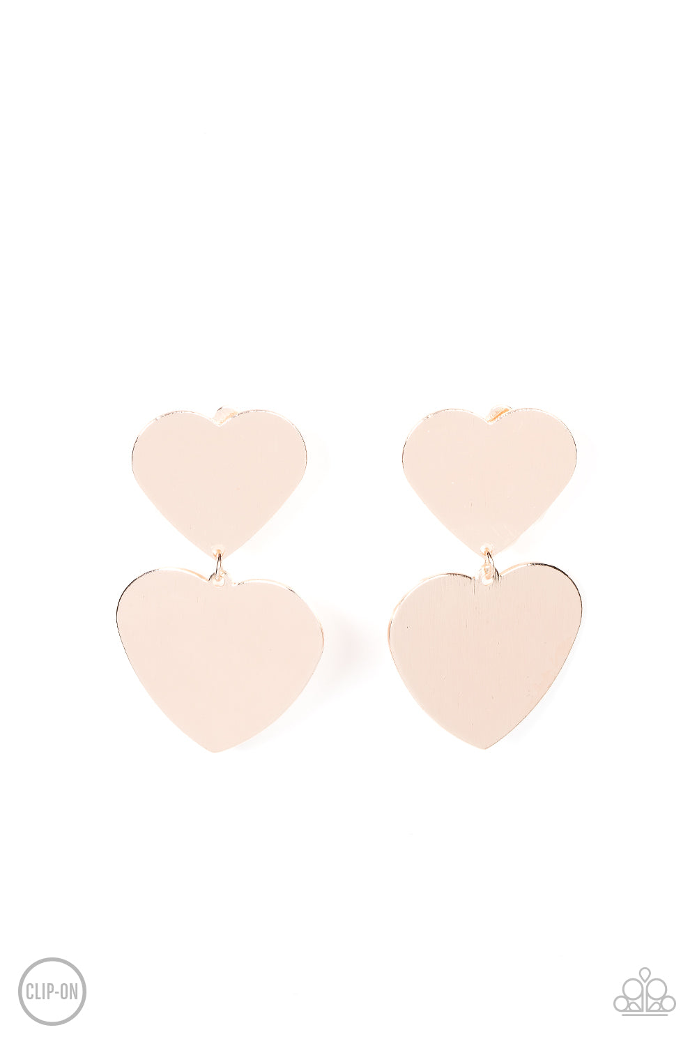 Featuring a shimmery scratched finish, an oversized rose gold heart charm swings from the bottom of a smaller rose gold heart charm, resulting in a flirtatious lure. Earring attaches to a standard clip-on fitting.