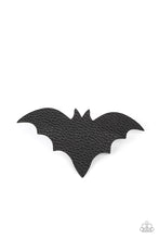 Load image into Gallery viewer, A black leather bat silhouette seemingly takes flight as it sits atop a silver clip creating an eerie illusion. Features a standard hair clip on the back.
