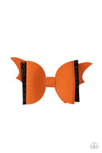 Load image into Gallery viewer, A soft orange leather bow and a sparkling black bow pair up to create a SPOOK-tacular impact over the silhouette of orange bat wings. Features a standard hair clip on the back. 
