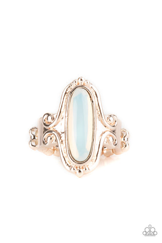 An elongated dewy white opal is nestled inside an ornately swirled rose gold frame resulting in a timeless allure atop the finger. Features a dainty stretchy band for a flexible fit. 
