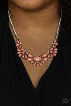 Load image into Gallery viewer, Teardrop Pale Rosette beads fan out from the bottoms of solitaire white rhinestones as they link below the collar, creating whimsically stacked frames. Featuring an oval center, oversized teardrop beads flare out from the centermost frame for a flirtatiously floral finish. Features an adjustable clasp closure. 
