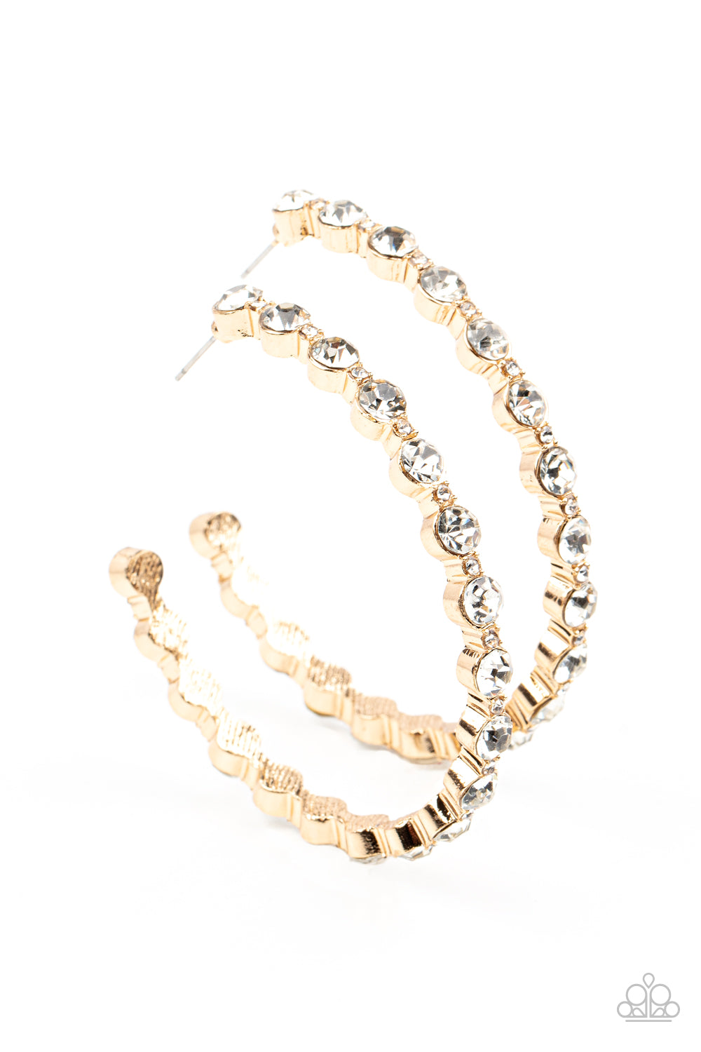 Encased in sleek gold fittings, a glamorous collection of glittery white rhinestones delicately coalesce into an oversized hoop for a sparkly statement. Earring attaches to a standard post fitting. Hoop measures approximately 2 1/2