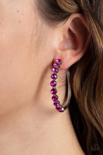 Load image into Gallery viewer, The front of a bold silver hoop is encrusted in flamboyant Fuchsia Fedora rhinestones, creating a glamorous pop of sparkle. Earring attaches to a standard post fitting. Hoop measures approximately 1 3/4&quot; in diameter. 
