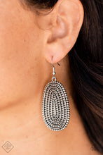 Load image into Gallery viewer, Rows of antiqued silver dotted texture radiate outward from an embossed center. The concentric lines create a rippling effect across the frame resulting in a rustic finish. Earring attaches to a standard fishhook fitting.  Sold as one pair of earrings.
