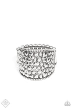 Load image into Gallery viewer, Brimming from edge to edge with a studded texture reminiscent of cobblestone, a wide silver band is bordered in dainty studs resulting in a free-spirited fashion atop the finger. Features a stretchy band for a flexible fit.  Sold as one individual ring.  Fashion Fix New Kit
