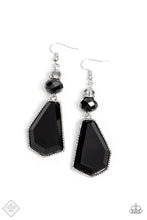 Load image into Gallery viewer, A shiny metallic bead, a white rhinestone encrusted accent, and a black defaced bead stack together above an oversized defaced bead. The sleek black asymmetrical pendant is encased in a studded silver frame, creating an edgy lure. Earring attaches to a standard fishhook fitting.  Sold as one pair of earrings.  New Kit Fashion Fix
