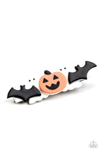 Load image into Gallery viewer, Pairs of black bats and white ghosts flank a spooky pumpkin, creating a SPOOK-tacular centerpiece. Features a standard hair clip on the back.
