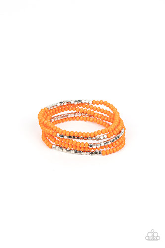 Infused with sections of shiny silver cube beads, a flamboyant collection of faceted orange beads are threaded along stretchy bands around the wrist for a vivacious pop of color. 