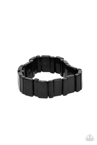 Painted in a shiny black finish, a mismatched collection of acrylic rectangular frames are threaded along stretchy bands around the wrist for a bold pop of color.