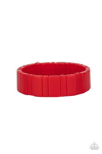 Painted in a fiery red finish, a mismatched collection of acrylic rectangular frames are threaded along stretchy bands around the wrist for a flamboyant pop of color.