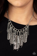 Load image into Gallery viewer, Infused with lifelike textures, an oversized assortment of silver feathers alternate with free-falling silver chains along a chunky section of silver chain, creating a free-spirited fringe. Features an adjustable clasp closure. 
