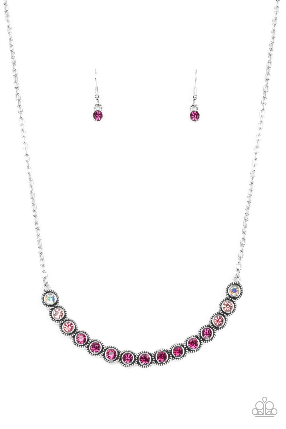 Encased in studded silver fittings, a glittery ombré of pink rhinestones delicately bows below the collar, creating an enchanting pop of color. Features an adjustable clasp closure.