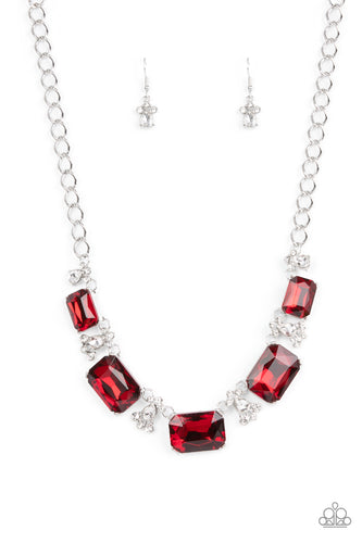 Featuring a fiery finish, an oversized collection of emerald cut red rhinestones link with rhinestone dotted teardrop rhinestone frames below the collar for a jaw-dropping display. Features an adjustable clasp closure. 