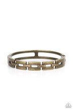 Load image into Gallery viewer, An antiqued row of rectangular brass links boldly interlock across the top of the wrist, coalescing into an edgy bangle-like bracelet. Features a hinged closure.
