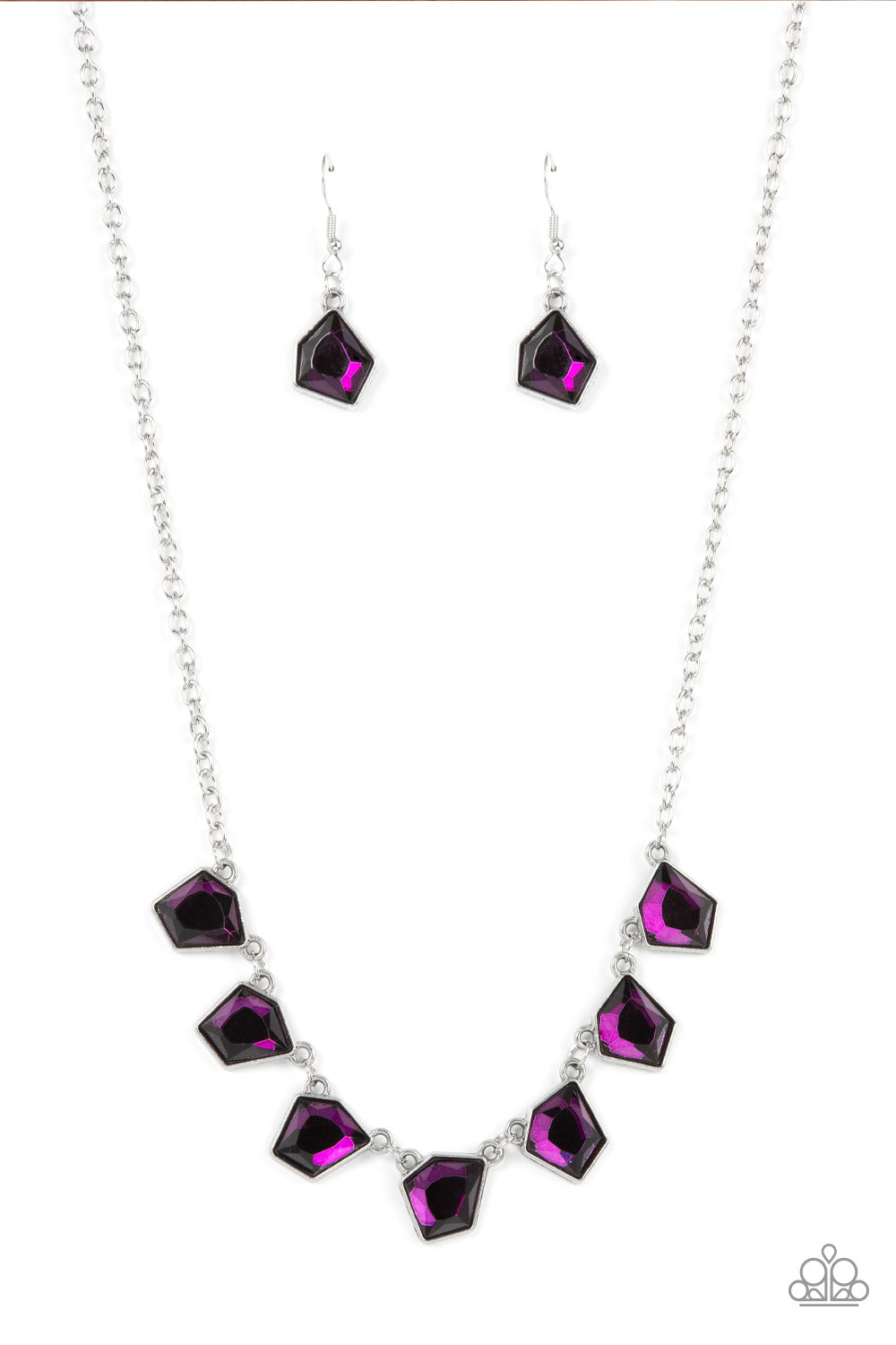 Featuring a flashy faceted finish, imperfect purple gems delicately link below the collar for an edgy pop of glitzy iridescence. Features an adjustable clasp closure. 