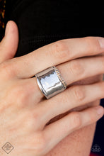 Load image into Gallery viewer, A wave of sparkling dainty light topaz rhinestones floats across the border of a wide hammered silver band. The opposite border is free of adornment, resulting in an upscale artisan edge. Features a stretchy band for a flexible fit.  Sold as one individual ring.  Fashion Fix New Kit
