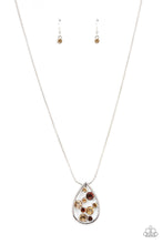 Load image into Gallery viewer, A bubbly collection of classic and golden topaz rhinestones coalesce inside an airy silver teardrop, resulting in an effervescently elegant pendant at the bottom of a rounded silver snake chain. Features an adjustable clasp closure. 
