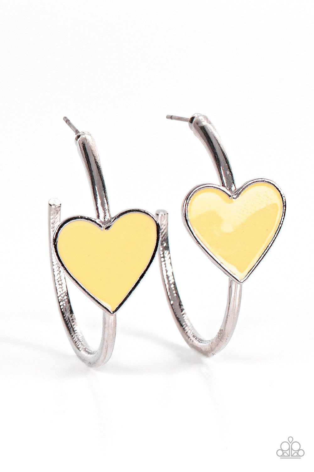 A charming Illuminating heart adorns the front of a classic silver hoop resulting in a whimsical fashion. Earring attaches to a standard post fitting. Hoop measures approximately 1 1/4