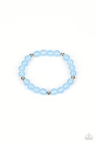 Infused with silver accents, a glassy collection of opaque blue beads are threaded along a stretchy band around the wrist for a dreamy glow.  Sold as one individual bracelet.