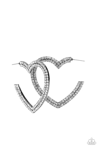 Tow rows of blinding white rhinestones are encrusted along the front of a heart shaped gunmetal hoop, creating a heart-stopping sparkle. Hoop measures approximately 2