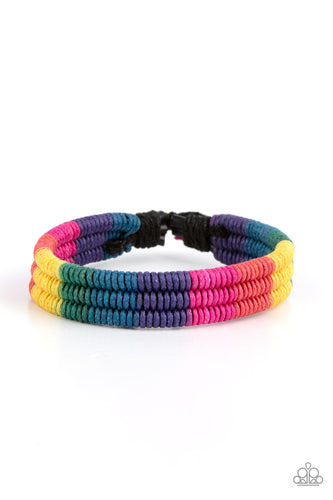 Colorful sections of pink, red, yellow, green, blue, and purple cords ornately wrap and weave around three black bands, coalescing into a radiant rainbow around the wrist. Features an adjustable sliding knot closure.