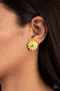 Layers of yellow petals fan out from an oversized white rhinestone fitting, blooming into a sparkly floral centerpiece. Earring attaches to a standard post fitting.