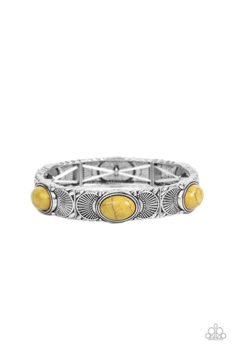 Flanked by silver halfmoon accents, Willow stone dotted silver frames are threaded along stretchy bands around the wrist for a rustic flair.