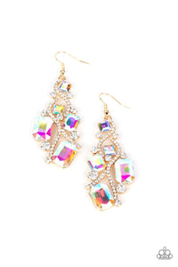 Golden ribbons of glassy white rhinestones whirl around a chandelier of classic round white rhinestones and emerald and square cut iridescent rhinestones, coalescing into an effervescent elegance. Earring attaches to a standard fishhook fitting.  Sold as one pair of earrings.