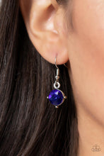 Load image into Gallery viewer, A sparkly row of oversized blue gems regally sit atop emerald cut smoky rhinestone bases as they delicately link along a dainty silver chain below the collar, resulting in a royal glamorous centerpiece. Features an adjustable clasp closure.
