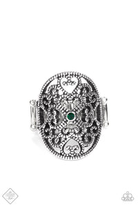 Whimsical heart-shaped studded filigree replays in a fanciful fashion inside a daintily studded antiqued silver frame. A single petite emerald green rhinestone rests in the center adding a splash of charismatic color atop the finger. Features a stretchy band for a flexible fit.  Sold as one individual ring.  Fashion Fix