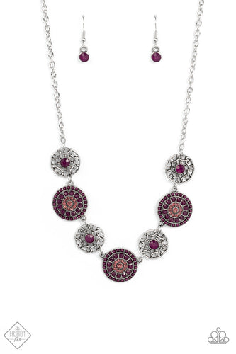 Bursts of faceted plum beads and sparkling light amethyst rhinestones radiate from the centers of antiqued silver frames, while smaller airy frames are dotted with plum centers. The whimsical designs alternate around the collar making a dazzling display. Features an adjustable clasp closure.  Sold as one individual necklace. Includes one pair of matching earrings.