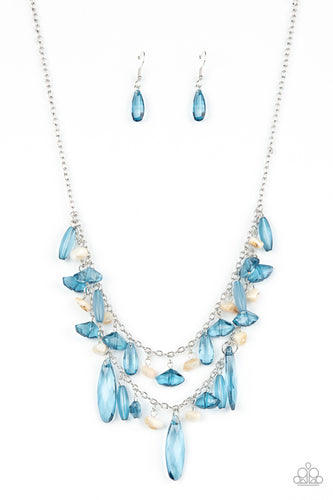 Pearly white pebbles and an assortment of blue crystal-like beads trickle from two silver chains, creating a prismatically layered look below the collar. Features an adjustable clasp closure