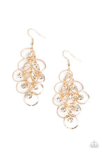 Load image into Gallery viewer, Shimmering rows of glassy white rhinestones and textured gold hoops cascade from a netted metallic backdrop, interlocking into a dizzyingly dazzling lure. Earring attaches to a standard fishhook fitting. 
