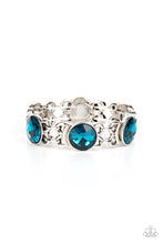 Load image into Gallery viewer, Featuring edgy chain-like fittings, a sparkly series of oversized blue rhinestones are threaded along stretchy bands around the wrist for a dramatic pop of glitz. 
