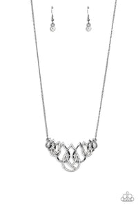Gradually increasing in size, glistening gunmetal and white rhinestone encrusted gunmetal teardrops ornately interlock below the collar for a glamorous fashion. Features an adjustable clasp closure.