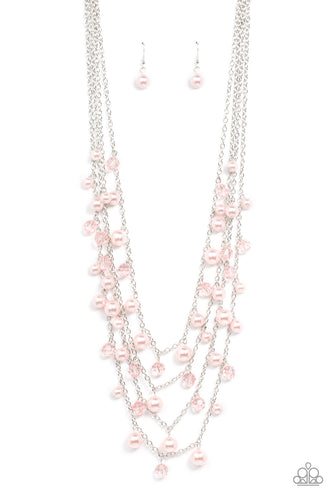 Row after row of bubbly pink pearls and glittery crystal-like beads swing from layered silver chains across the chest, creating a noise-making display. Features an adjustable clasp closure.