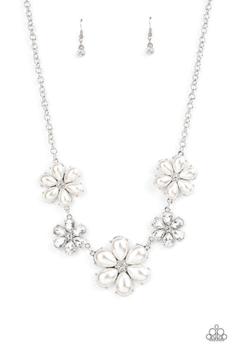 Featuring glassy white rhinestone centers, bubbly pearl petaled flowers gradually increase in size as they alternate with white rhinestone petaled flowers below the collar for a fierce floral fashion. Features an adjustable clasp closure.  Sold as one individual necklace. Includes one pair of matching earrings.