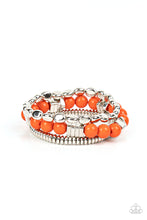 Load image into Gallery viewer, A mismatched collection of silver discs, silver cubes, bubbly orange acrylic, and silver pebble-like beads are threaded along stretchy bands around the wrist, creating vivacious layers
